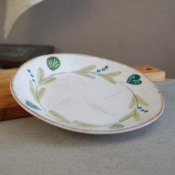 Assiette plate en céramique                                  