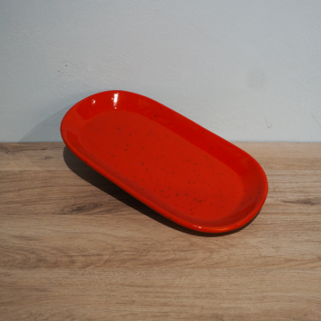 Petite assiette ovale en céramique                                   